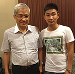 郎咸平與經紀人李志合影